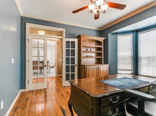 3133 Beacon Hill St, Edmond, OK 73034 - office with french doors, ceiling fan, light wood finished floors, and crown molding