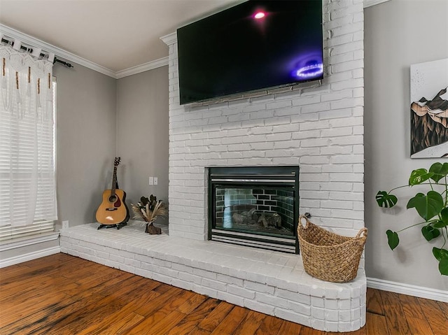 3133 Beacon Hill St, Edmond, OK 73034 - detailed view of crown molding, wood finished floors, and a brick fireplace