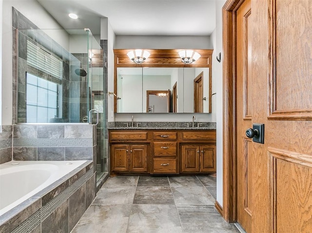 3133 Beacon Hill St, Edmond, OK 73034 - full bath with double vanity, a garden tub, and a stall shower