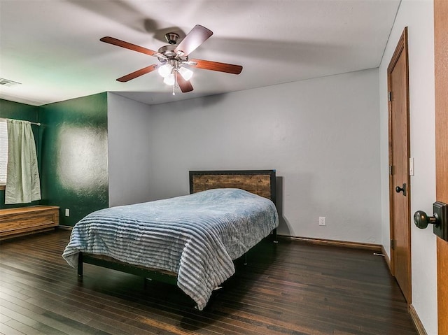 3133 Beacon Hill St, Edmond, OK 73034 - bedroom with wood-type flooring and ceiling fan