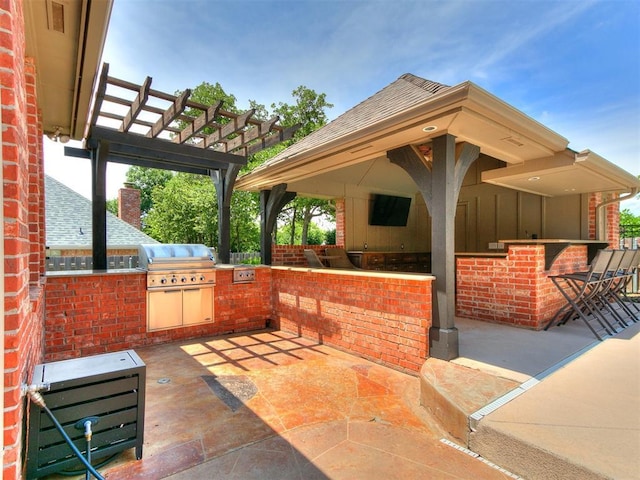 3133 Beacon Hill St, Edmond, OK 73034 - view of patio / terrace with an outdoor kitchen, exterior bar, and a pergola