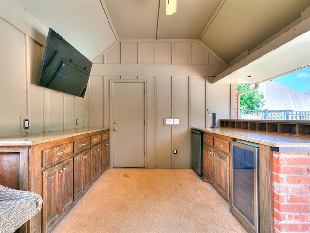 3133 Beacon Hill St, Edmond, OK 73034 - bar featuring lofted ceiling, wine cooler, and light carpet