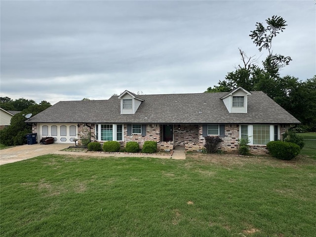 804 William Blvd, Seminole, OK 74868 - view of front of house with roof with shingles, a front lawn, and brick siding