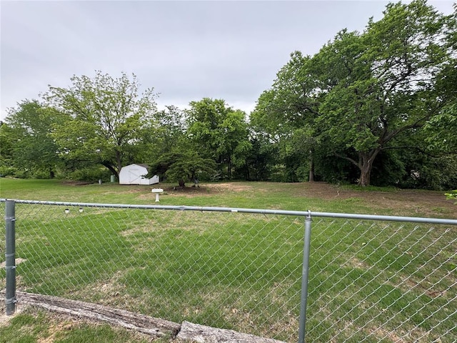 804 William Blvd, Seminole, OK 74868 - view of yard with fence, a shed, and an outdoor structure