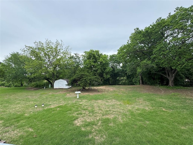 804 William Blvd, Seminole, OK 74868 - view of yard with an outdoor structure and a shed