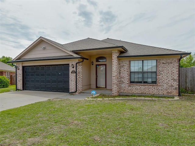 ranch-style house featuring a garage, fence, concrete driveway, a front lawn, and brick siding