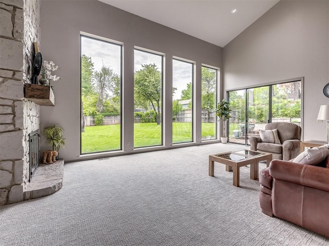 1011 Saint Andrews Dr, Edmond, OK 73025 - living area featuring high vaulted ceiling and carpet flooring