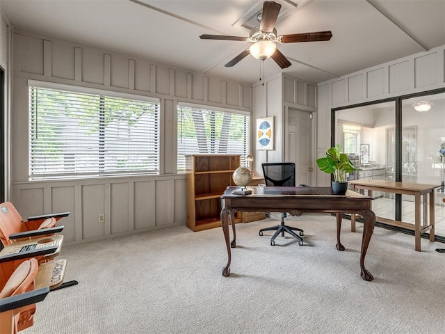 1011 Saint Andrews Dr, Edmond, OK 73025 - office with a decorative wall, light carpet, a ceiling fan, and plenty of natural light