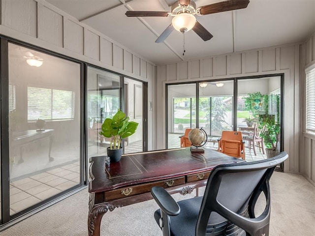 1011 Saint Andrews Dr, Edmond, OK 73025 - office space with healthy amount of natural light, light colored carpet, a ceiling fan, and a decorative wall