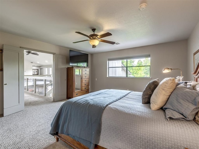 1011 Saint Andrews Dr, Edmond, OK 73025 - bedroom with carpet floors and ceiling fan