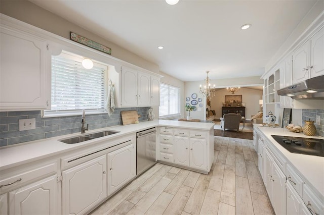 3205 NW 54th Cir, Oklahoma City, OK 73112 - kitchen with stainless steel dishwasher, black electric cooktop, under cabinet range hood, white cabinets, and recessed lighting