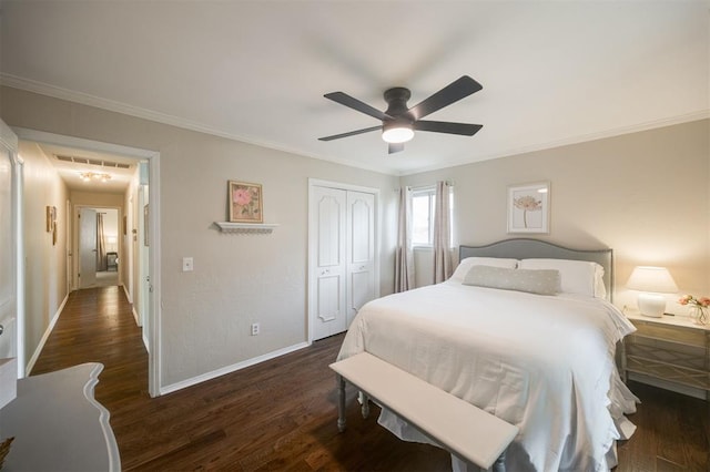 3205 NW 54th Cir, Oklahoma City, OK 73112 - bedroom with ornamental molding, a closet, wood finished floors, and a ceiling fan