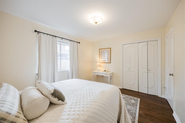 3205 NW 54th Cir, Oklahoma City, OK 73112 - bedroom with dark wood finished floors and a closet
