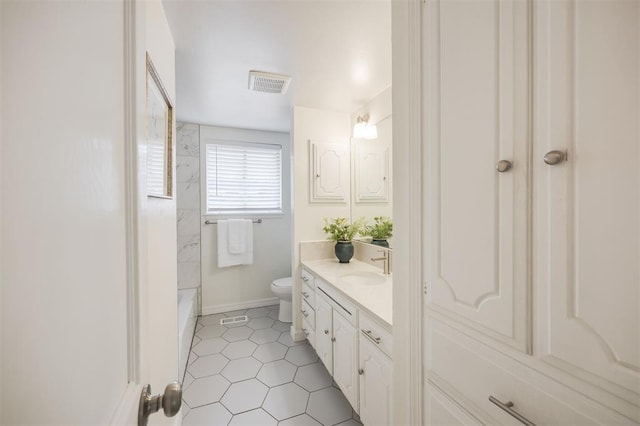 3205 NW 54th Cir, Oklahoma City, OK 73112 - full bathroom featuring vanity and tile patterned flooring