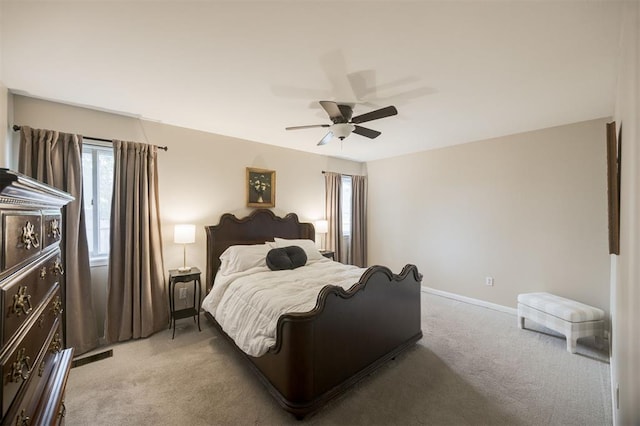 3205 NW 54th Cir, Oklahoma City, OK 73112 - bedroom with light carpet and a ceiling fan