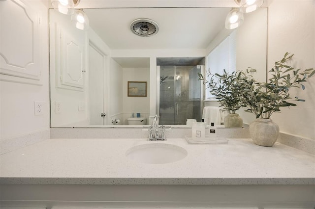 3205 NW 54th Cir, Oklahoma City, OK 73112 - full bathroom featuring a shower stall and vanity