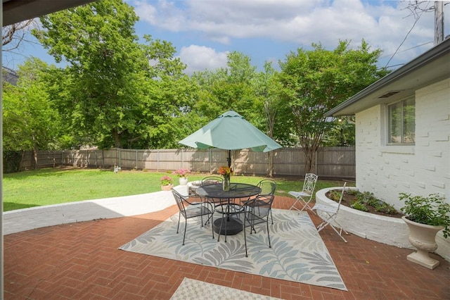 3205 NW 54th Cir, Oklahoma City, OK 73112 - fenced backyard featuring outdoor dining area and a patio area