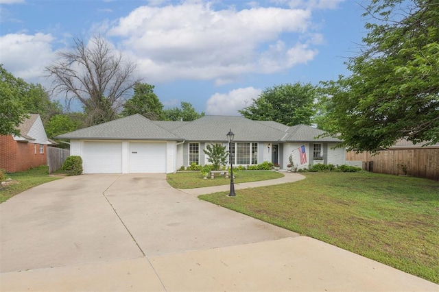 3205 NW 54th Cir, Oklahoma City, OK 73112 - single story home featuring an attached garage and driveway