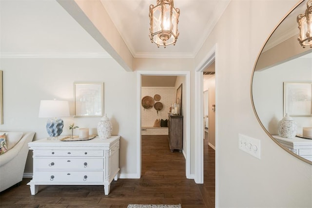 3205 NW 54th Cir, Oklahoma City, OK 73112 - corridor featuring crown molding, dark wood-type flooring, and a chandelier
