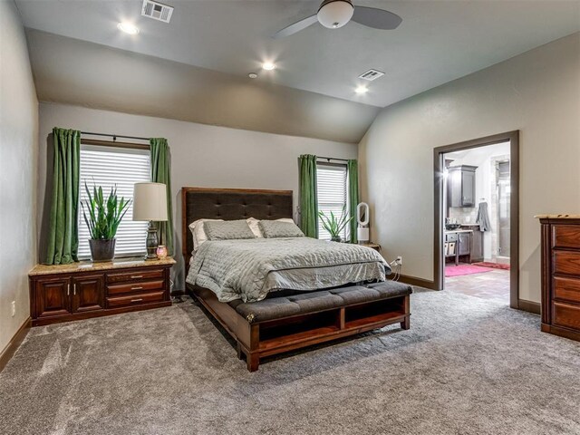 9408 S Caldwell Dr, Midwest City, OK 73130 - carpeted bedroom with lofted ceiling, baseboards, and ceiling fan