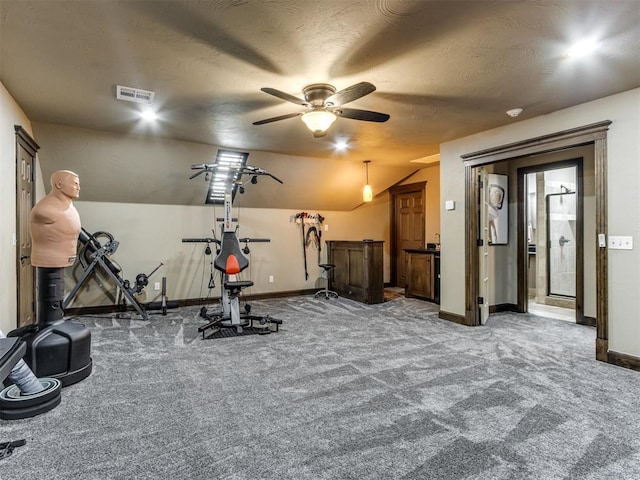 9408 S Caldwell Dr, Midwest City, OK 73130 - exercise area with baseboards, a ceiling fan, vaulted ceiling, carpet flooring, and a bar