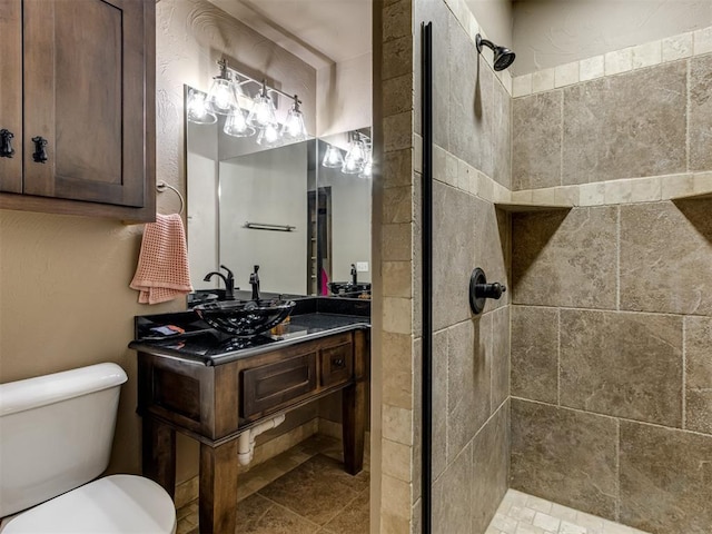 9408 S Caldwell Dr, Midwest City, OK 73130 - full bathroom with tiled shower, toilet, and vanity