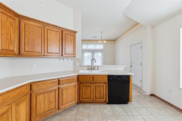kitchen with a sink, a peninsula, brown cabinets, dishwasher, and light countertops