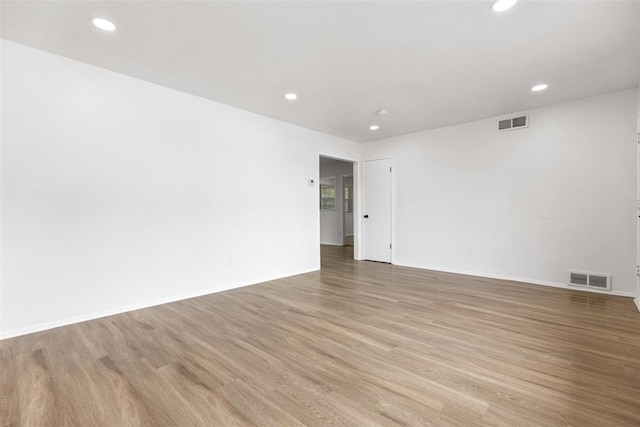 3601 N Terry Ave, Oklahoma City, OK 73111 - empty room with baseboards, recessed lighting, light wood-style floors, and visible vents