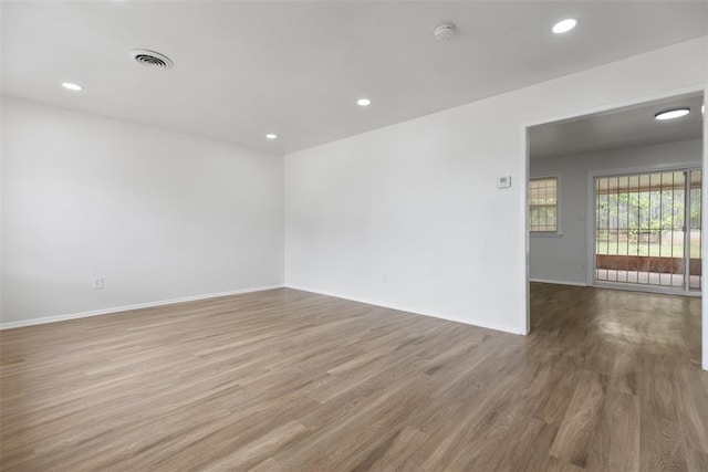3601 N Terry Ave, Oklahoma City, OK 73111 - unfurnished room with recessed lighting, baseboards, visible vents, and wood finished floors