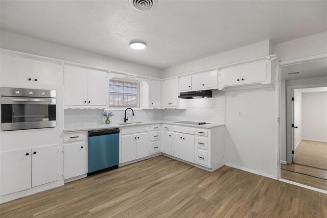 3601 N Terry Ave, Oklahoma City, OK 73111 - kitchen with a sink, oven, visible vents, under cabinet range hood, and dishwasher