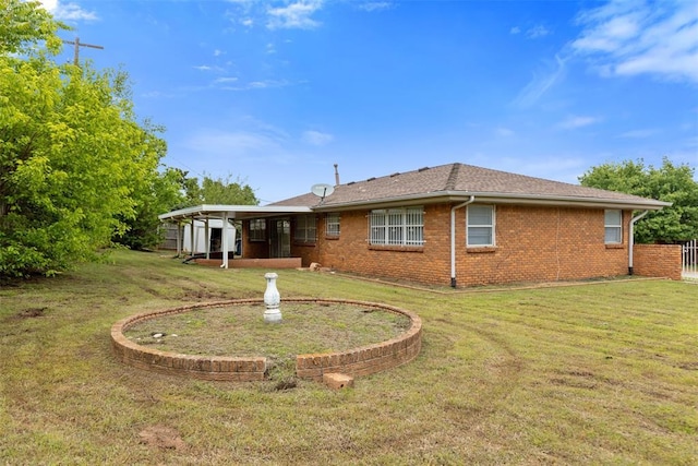 3601 N Terry Ave, Oklahoma City, OK 73111 - rear view of house featuring a yard and brick siding