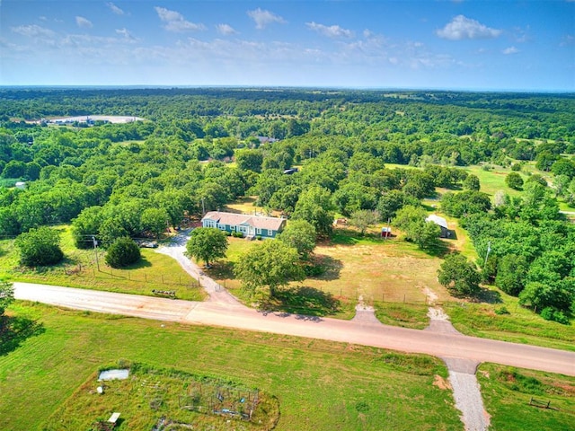 bird's eye view featuring a view of trees