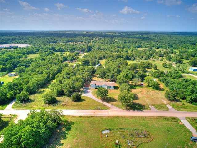 bird's eye view featuring a view of trees
