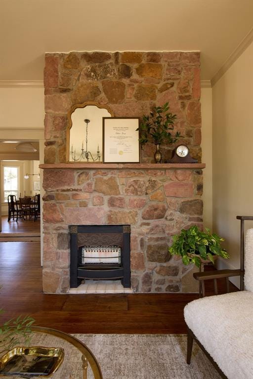 1801 N Broadway Ave, Shawnee, OK 74804 - interior space with a stone fireplace, crown molding, and wood finished floors