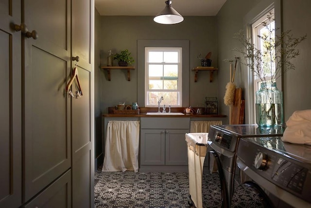 1801 N Broadway Ave, Shawnee, OK 74804 - kitchen with a sink, open shelves, and washer and dryer