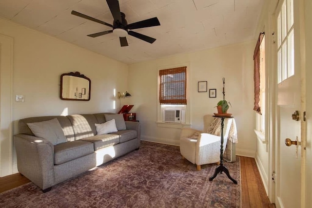 1801 N Broadway Ave, Shawnee, OK 74804 - living area featuring cooling unit, a wealth of natural light, baseboards, and ceiling fan