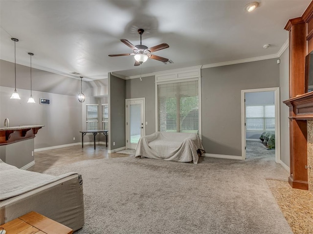 7705 Twin Oaks Dr, Yukon, OK 73099 - bedroom with crown molding, baseboards, light colored carpet, and ceiling fan