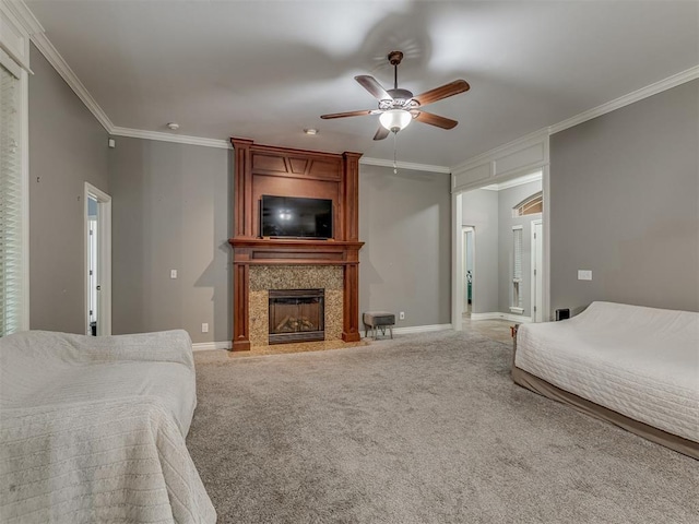 7705 Twin Oaks Dr, Yukon, OK 73099 - bedroom with ornamental molding, a high end fireplace, light colored carpet, baseboards, and a ceiling fan