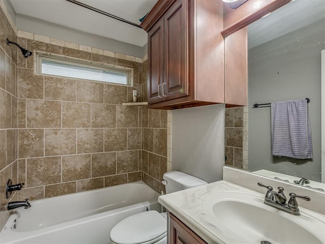 7705 Twin Oaks Dr, Yukon, OK 73099 - bathroom featuring toilet, vanity, and bathtub / shower combination