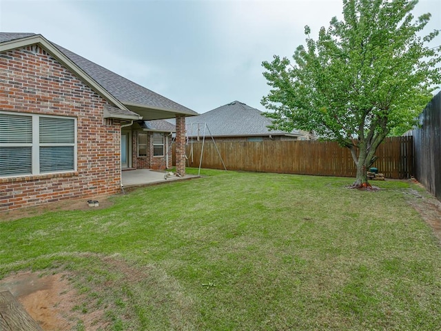 7705 Twin Oaks Dr, Yukon, OK 73099 - view of yard featuring a patio area