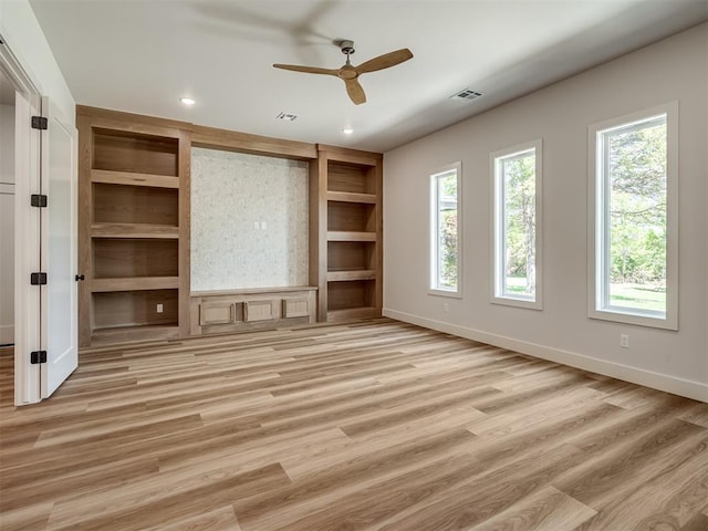 unfurnished living room featuring ceiling fan, light wood-style flooring, recessed lighting, and baseboards