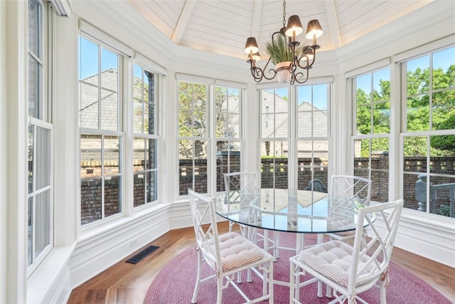 368 Millbrook Dr, Norman, OK 73072 - sunroom / solarium with healthy amount of natural light, a chandelier, wood finished floors, and ornamental molding