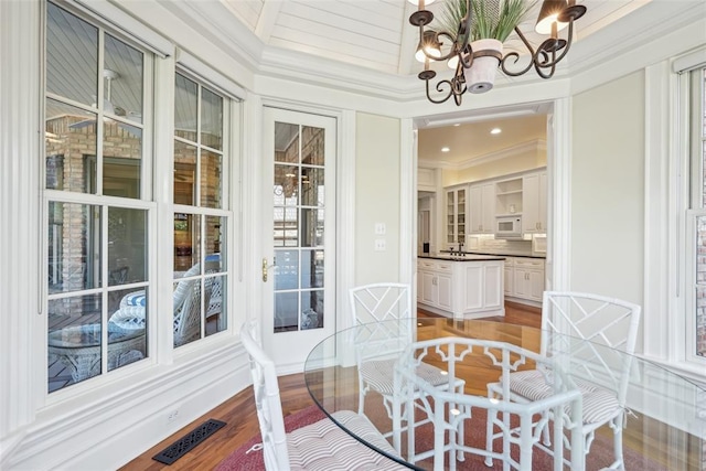 368 Millbrook Dr, Norman, OK 73072 - sunroom / solarium featuring a chandelier