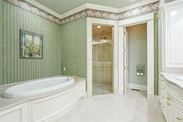 368 Millbrook Dr, Norman, OK 73072 - full bath featuring a stall shower, a garden tub, ornamental molding, vanity, and baseboards