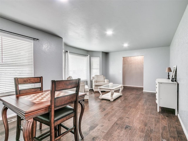 7700 Wegner Way, Oklahoma City, OK 73162 - dining space featuring a textured wall, wood finished floors, recessed lighting, and baseboards