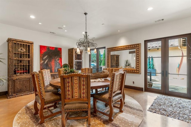 9639 Horizon Cir, Sperry, OK 74073 - dining space featuring recessed lighting, visible vents, french doors, and a notable chandelier