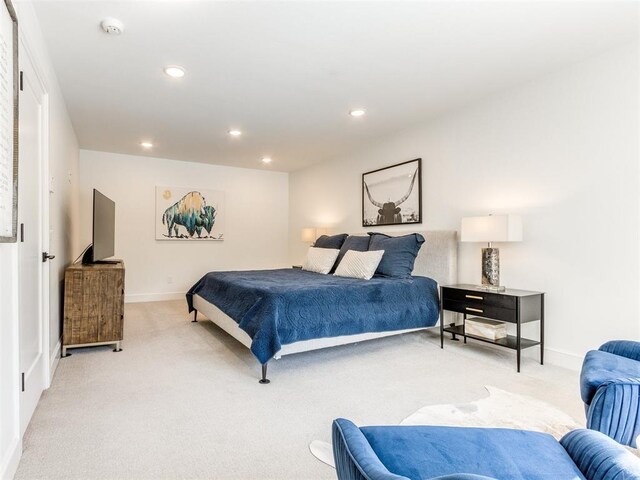 11825 Leaning Elm Rd, Oklahoma City, OK 73120 - bedroom featuring light colored carpet and recessed lighting
