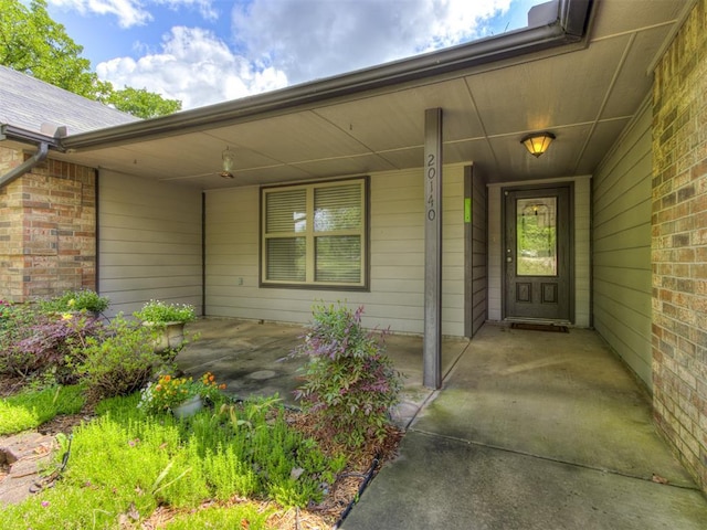 20140 N Rolling Meadows Dr, Luther, OK 73054 - entrance to property with brick siding and a porch