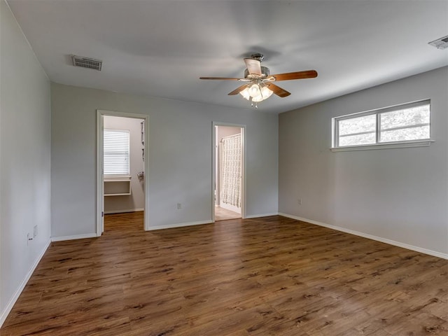 20140 N Rolling Meadows Dr, Luther, OK 73054 - empty room featuring ceiling fan, baseboards, and wood finished floors