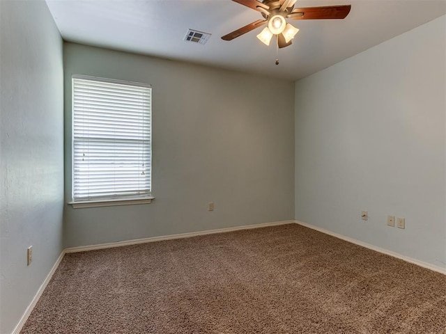 20140 N Rolling Meadows Dr, Luther, OK 73054 - carpeted empty room featuring a ceiling fan and baseboards
